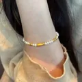 Elegant pearl beaded bracelet with cute gold fish charm, stylish wrist jewelry for women. - Pearl Goldfish Pendant Style (MY30616)