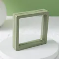Grünes quadratisches schwimmendes Schmuckaufbewahrungsbox mit transparenter PE-Folie für Ringe. - 9x9cm Displaybox (Inklusive Zufälliger Kleiner Karte) / Grün