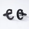 Close-up detail shot of black letter C cufflinks, perfect for formal french shirts. - Letter C Style (B1210-C) / Black
