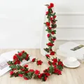 Artificial rose vine flower garland detail shot, vibrant red floral decor for home room wall. - Spring Red