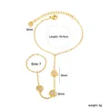 Vue détaillée d'un bracelet de doigt en acier inoxydable doré avec des dimensions. - Style Cœur Strass (BL20100AG)