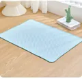 Close-up of light blue pet cooling mat with breathable honeycomb texture on floor - XS (40x30cm) / Blue