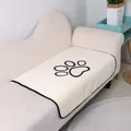 Washable coral fleece pet absorbent pad with black paw print for sofa protection - Beige