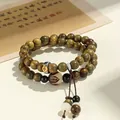 Double-strand green sandalwood beaded bracelet with lotus charm and traditional accents - Rooster (Acala Bodhisattva)