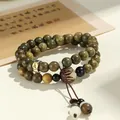 Double loop green sandalwood beaded bracelet with carved lotus pendant and metal charm - Rabbit (Manjusri Bodhisattva)