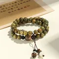 Green sandalwood double-loop beaded bracelet with carved guardian deity Buddha charms - Goat & Monkey (Vairocana Buddha)