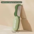 Compact foldable pet grooming comb in green, ideal for cat and dog hair cleaning - 3.8x12.6cm / Green