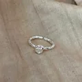 Detailed view of the irregular molten texture on this 925 sterling silver open ring. - Lava Texture Open Style (JZ0650) / Adjustable Open / Silver
