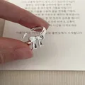 Elegant 925 sterling silver bowknot open ring with a high-polished silver finish. - Polished Bowknot Style (JZ0899) / Adjustable Open / Silver