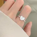 Elegant minimalist 925 sterling silver heart ring featuring a textured twisted band design - Heart Embossed Twisted Rope Style (JZ1114) / Adjustable Open / Silver