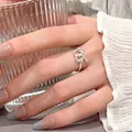 925 sterling silver twisted knot open ring for women in elegant lifestyle setting - Double Loop Twisted Rope Woven Style (JZ0526) / Adjustable Open / Silver
