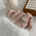 Elegant 925 sterling silver adjustable ring featuring a textured minimalist flower motif - Hammered Six-petal Floral Style (JZ0961) / Adjustable Open / Silver