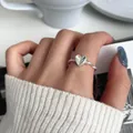 Elegant 925 sterling silver ring with twisted band and a polished heart centerpiece - Twisted Rope Heart Style (JZ0111) / Adjustable Open / Silver