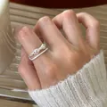 Elegant 925 sterling silver double-layered open ring with bow design on index finger - Double Layer Bowknot Style (JZ0165) / Adjustable Open / Silver