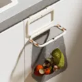 Foldable hanging trash bag rack for kitchen cabinet doors with metal clips - 1 Piece/Pack / White