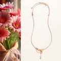 Collier élégant en perles de quartz rose avec pendentif coeur et détails tourmaline - Pendentif Cœur Quartz Rose