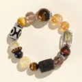 Armband aus Tigerauge und Black Gold Super Seven mit originellem Dzi-Perlen-Design - Wohlstands-Charakter Stil