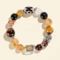 Handgefertigtes Perlenarmband mit Tigerauge und einer dreiäugigen Dzi-Perle - Kleine Perlen Stil