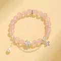 Bracelet élégant en perles de cristal rose avec breloque lotus et perle d'eau douce - Quartz Rose