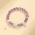 Elegante bracciale di perline viola con ciondoli a loto, farfalla e perla pendente - Stile Ametista