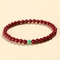 Red cinnabar beaded bracelet with a light turquoise accent bead for women - Purple Gold Cinnabar Artificial Turquoise Style / 4mm
