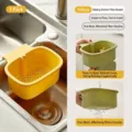 Yellow kitchen sink drain basket featuring fine mesh and press-to-open bottom filter - 1 Piece / Yellow