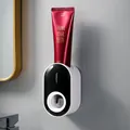 Wall-mounted automatic toothpaste dispenser with sleek black and white modern design - Black+White