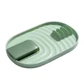Durable green plastic kitchen utensil rest for spatulas and pot lids on white background - Grass Green