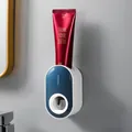 Automatic wall-mounted toothpaste dispenser in elegant white and navy blue finish - Ocean Blue And White