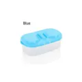 Double-compartment plastic food storage container with a blue lid for kitchen use - Blue