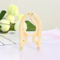 Light yellow portable folding travel clothes hanger made of durable plastic material - Yellow
