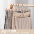 Adjustable khaki plastic pants hangers with non-slip clips and heavy duty grip, 34x15cm size - Brown