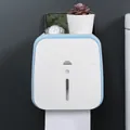 Wall-mounted bathroom tissue box with phone holder and storage shelf in blue and white. - Blue