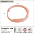 Portable folding desk bag hook in sakura pink made of durable ABS material for school desks - Sakura Pink