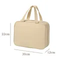 Durable beige Oxford cloth travel toiletry organizer bag showing 30x22x12cm product size - Cubic Handheld Style / 30x22x12cm / Milk Apricot