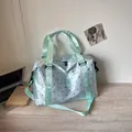 Large capacity light blue polka dot travel bag with handle and shoulder strap - One Size / Green