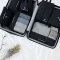 Black 7-piece travel packing cubes set made of Oxford fabric for efficient luggage organization - 7-piece Set / Black