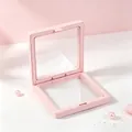 Boîte à bijoux flottante en film PE rose, présentoir anti-oxydation pour colliers et boucles - 7*7*2cm / Rose