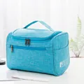 Große blaue tragbare Reise-Kulturtasche mit Griff und Reißverschlüssen - Blau
