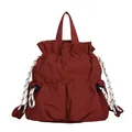 Waterproof nylon drawstring backpack in brick red with large capacity for travel - Red