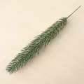 Close-up detail of a realistic green artificial pine branch for DIY home decor crafts. - Green