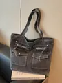 Large capacity charcoal gray denim tote bag with double front pockets and tassel zippers - One Size / Black