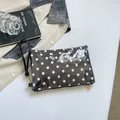 Borsa cosmetica a pois bianchi e neri con pratico cinturino da polso - Taglia unica / Pois Neri (Nero)