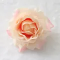 Detailed macro view of artificial silk rose head in champagne and pink for wedding decoration - Flesh Pink
