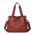 Large capacity brick red nylon travel tote bag with SUOYATE branded shoulder straps - One Size / Red