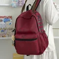 Stilvoller dunkelroter High-Street-Schulrucksack für Schüler mit großer Kapazität - Mit Anhänger / Rot