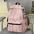 Modischer rosa Rucksack mit Sternenmuster auf einem grauen Bürostuhl - Rosa