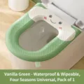 Universal waterproof green EVA toilet seat cover with cute cartoon face and pull tab - 1 Piece / Green