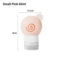 Refillable pink donut-shaped silicone travel bottle 60ml for portable cosmetic lotion storage - Small (60ml) / Pink