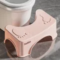 Pink ergonomic plastic toilet footstool featuring non-slip footprint design for bathroom - Pink